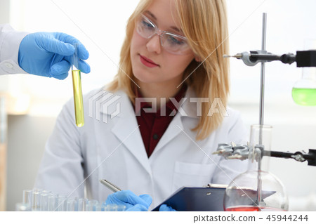 Technician hold in arms in protective gloves 45944244