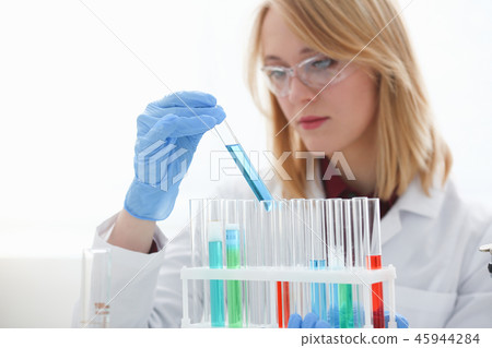 Technician hold in arms in protective gloves 45944284