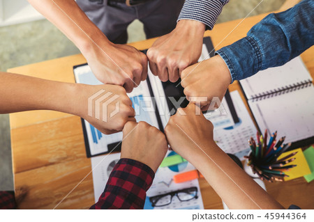 Teamwork of colleague assembly, Business team jointing putting f 45944364