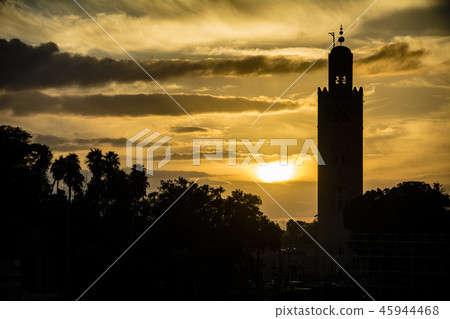Marrakesh mosque in silhouette at sundown in Moroc Marrakesh mosque in silhouette at sundown in Moroc 45944468