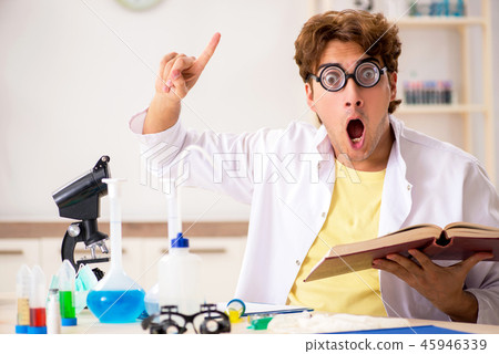 Funny crazy chemist doing experiments and tests 45946339