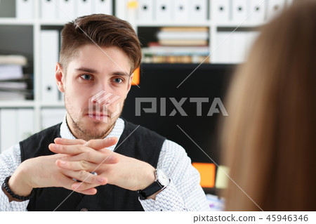 Handsome man in suit offer contract form Handsome man in suit offer contract form 45946346
