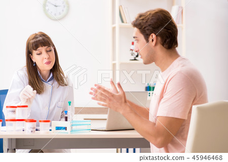 Male sperm donor visiting clinic Male sperm donor visiting clinic 45946468