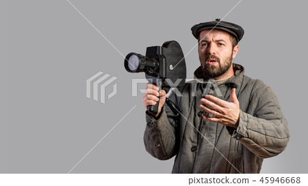 Emotional cameraman with retro camera, the 70th 45946668