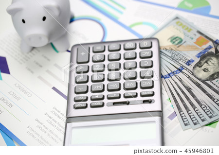 Silver calculator with gray keyboard is lying Silver calculator with gray keyboard is lying 45946801