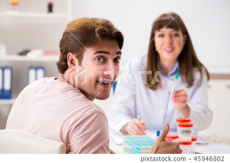 Male sperm donor visiting clinic Male sperm donor visiting clinic 45946802