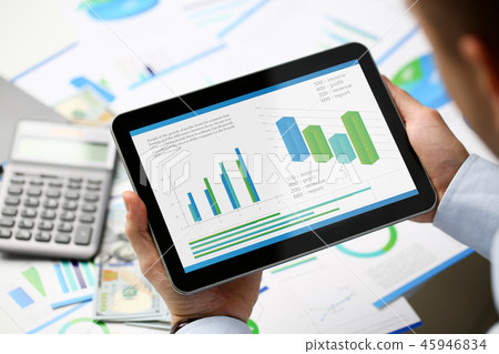 Businessman holding tablet in hands with Businessman holding tablet in hands with 45946834