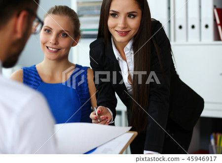 Group of people discuss bargain documents terms and conditions Group of people discuss bargain documents terms and conditions 45946917