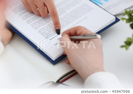 Arm fill and sign important form clipped to pad Arm fill and sign important form clipped to pad 45947098