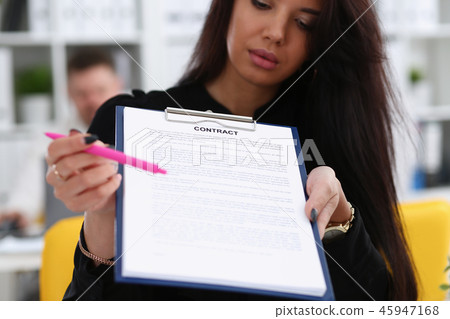 Female arm offer contract form on clipboard pad 45947168