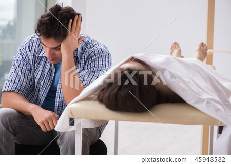 Man mourning his dead wife Man mourning his dead wife 45948582