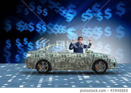 Businessman driving car covered with us dollars 45948868