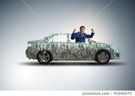 Businessman driving car covered with us dollars Businessman driving car covered with us dollars 45948873