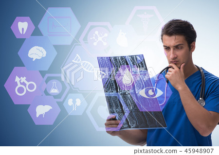 Doctor looking at x-ray image in telehealth concept 45948907