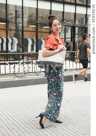 Young Japanese Woman Shopping in Shibuya Young Japanese Woman Shopping in Shibuya 45954016