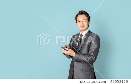 A man with a smartphone 45958159
