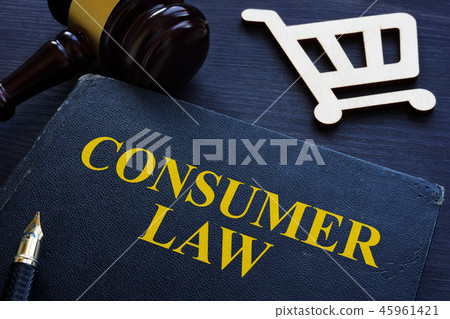 Consumer law, gavel and shopping cart on a desk. Consumer law, gavel and shopping cart on a desk. 45961421