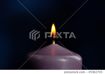 burning purple candle close-up burning purple candle close-up 45962703