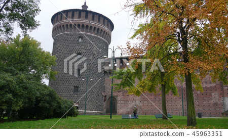 Italy Milan Sforzesco Castle and autumn leaves 45963351