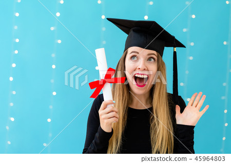 Young woman with a graduation diploma Young woman with a graduation diploma 45964803