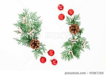 Christmas frame of pine branches and red balls Christmas frame of pine branches and red balls 45967169