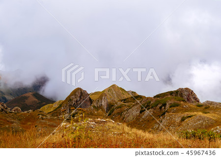 rocky cloudy mountain landscape 45967436