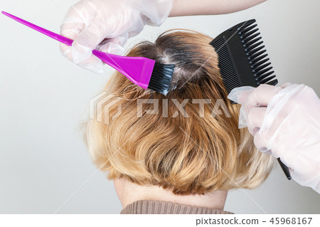 Dark roots of hair, overgrown hair Dark roots of hair, overgrown hair 45968167