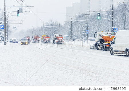 Snow plow truck at work 45968295