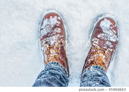 Snow on boots view from above 45968663