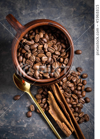 Coffee beans in old mug 45968815