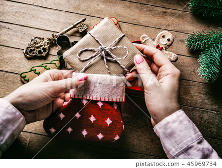 hands holding cgilden christmas key hands holding cgilden christmas key 45969734