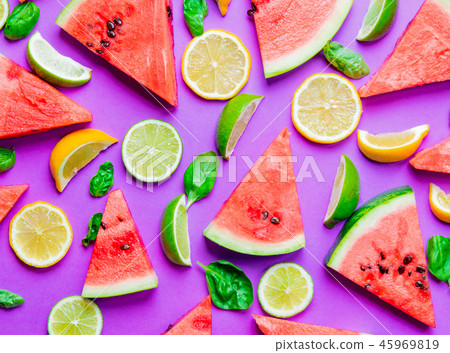 cutted lemons and limes with watermelon cutted lemons and limes with watermelon 45969819