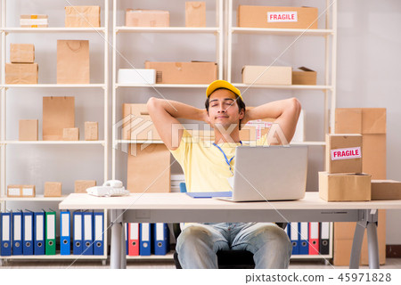 Handsome contractor working in box delivery relocation service  45971828