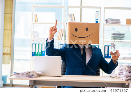 Happy man with box instead of his head 45971867