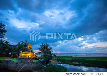 sunset above Naka snake sculpture at Karon beach sunset above Naka snake sculpture at Karon beach 45974396