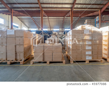 [Logistics scene] Corrugated cardboard stacked on a pallet in a distribution warehouse 45977086