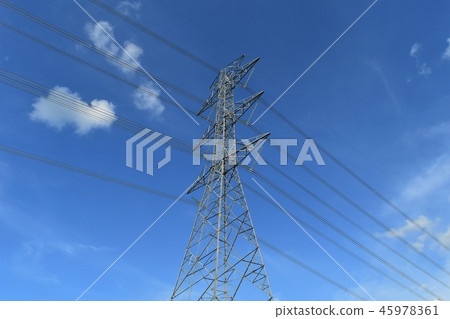 high voltage pole under blue sky 45978361
