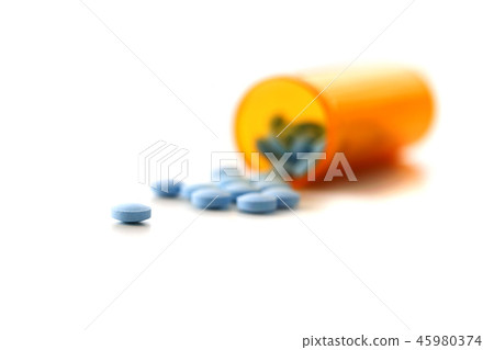Tablets scattered on the table of the 45980374