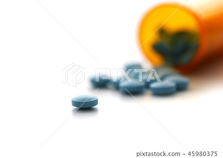 Tablets scattered on the table of the 45980375