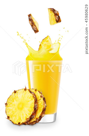 glass of splashing pineapple juice 45980629