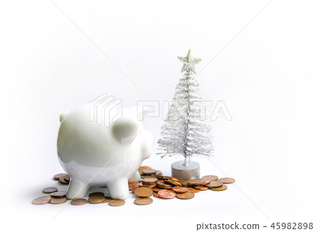 Piggy bank with coins. White ceramic moneybox. 45982898