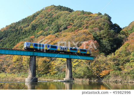 Water County Line "Mountain Fall Colors and Trains" against the blue sky Water County Line "Mountain Fall Colors and Trains" against the blue sky 45982996