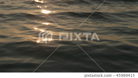 waves at sunset waves at sunset 45989413