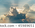 sunset with towering cumulus clouds 45989651