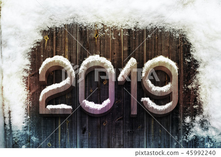 3d rendering of wooden digits '2019' slightly touched by snow on a wooden wall background covered 3d rendering of wooden digits '2019' slightly touched by snow on a wooden wall background covered 45992240