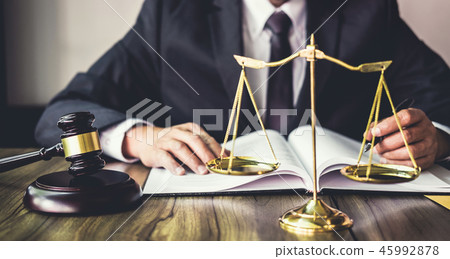 Judge gavel with Justice lawyers, Gavel on wooden table and Coun Judge gavel with Justice lawyers, Gavel on wooden table and Coun 45992878