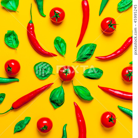 Above view at Chili pepper and tomatoes with basil Above view at Chili pepper and tomatoes with basil 45995245