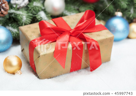 christmas gift box on snow christmas gift box on snow 45997743