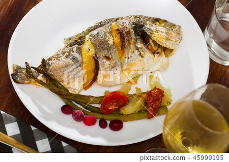 Sea bream baked in oven Sea bream baked in oven 45999195