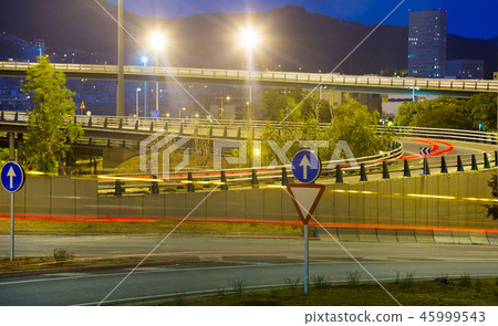Light trails on evening city motorway Light trails on evening city motorway 45999543